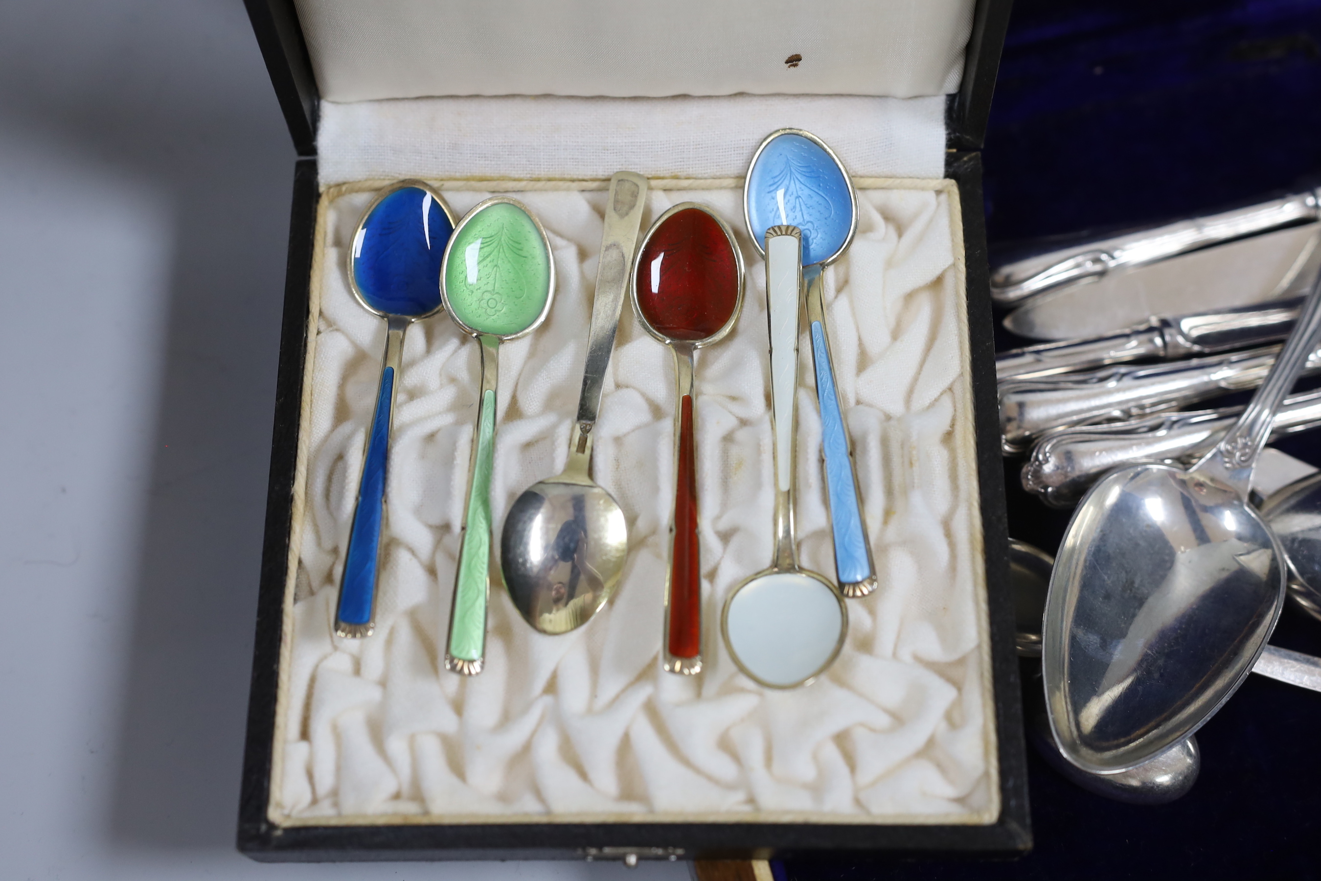 A cased set of six Norwegian 925S and enamelled coffee spoons, a cased set of six silver teaspoons and other assorted flatware including white metal.
